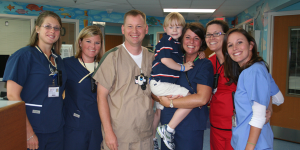 Carson surrounded by his doctor's at St. Judes. 