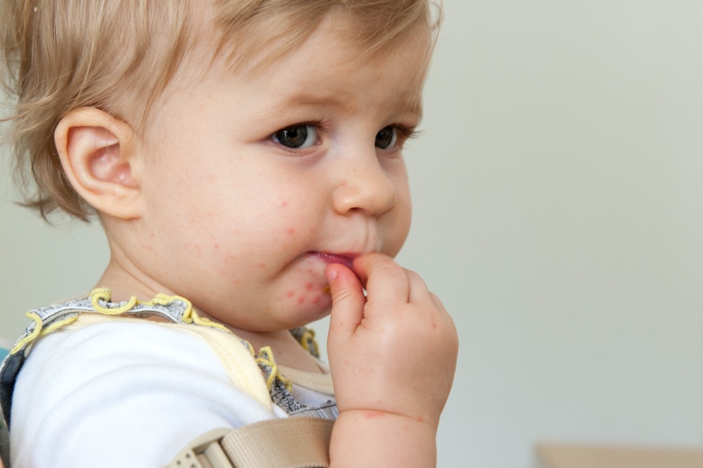 Baby's foot, low section (3-6 months), close-up stock photo